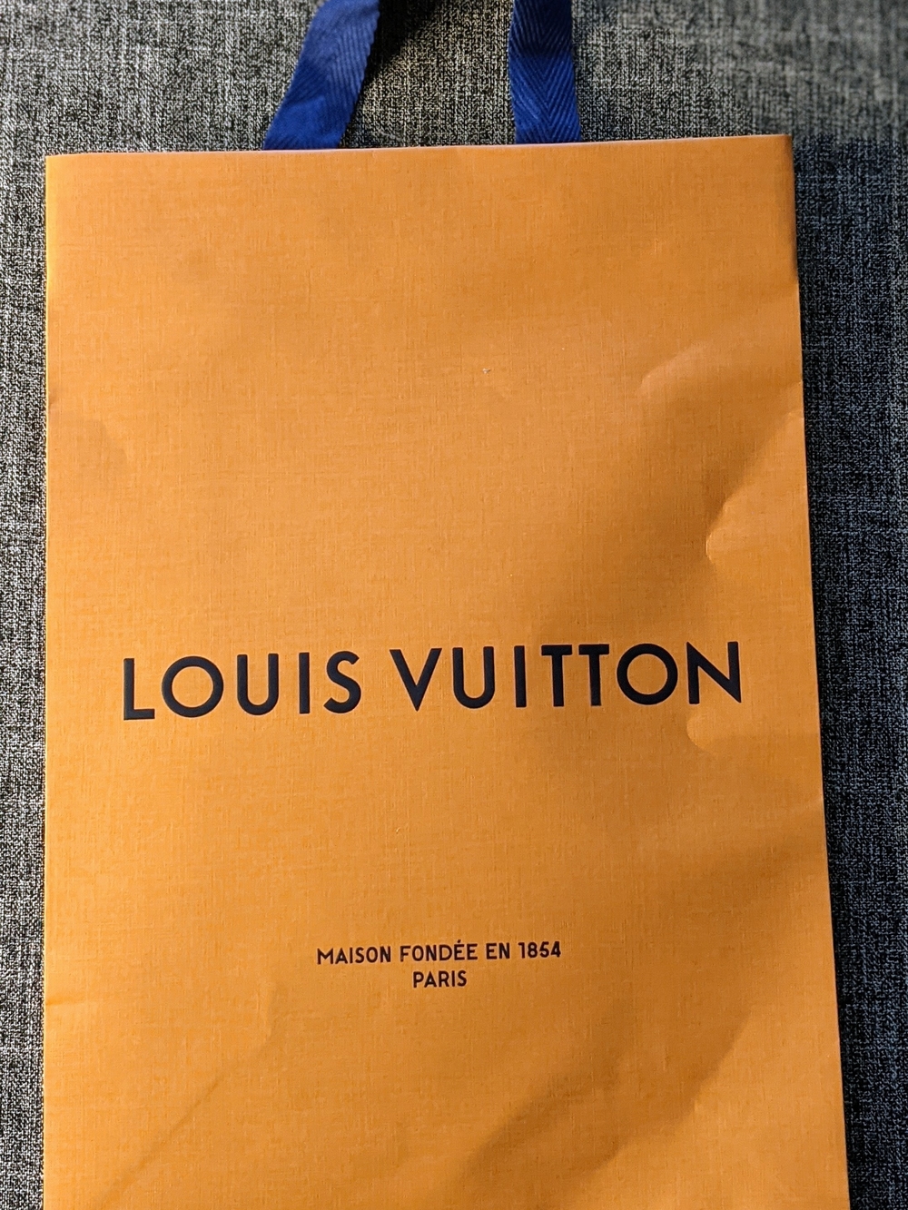 Louis Vuitton Orange Shopping Bag with Blue Handles